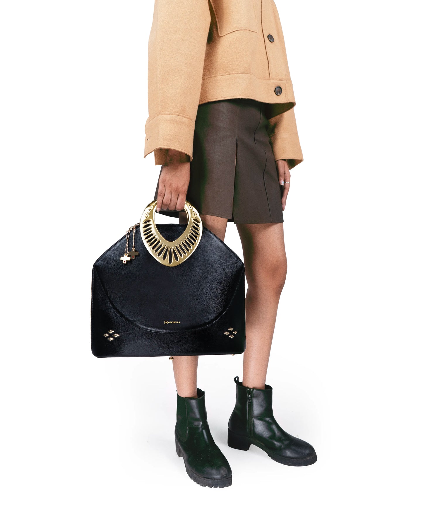 Close-up of engraved gold-plated geometric motifs — fine luxury craftsmanship