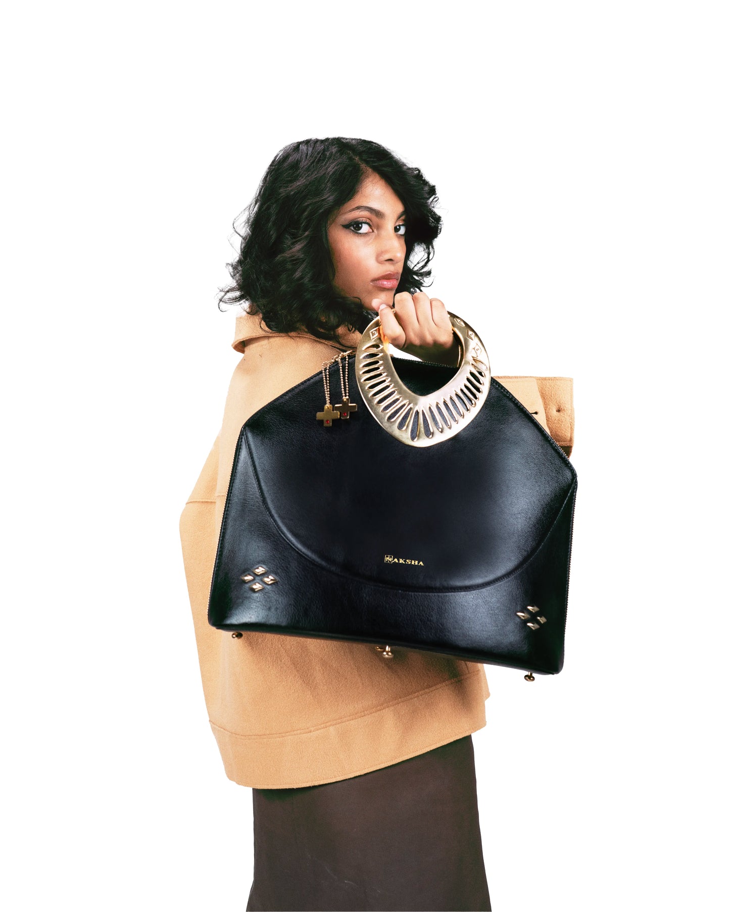 Gold hardware detailing with jewelry-grade precision — Conch bag