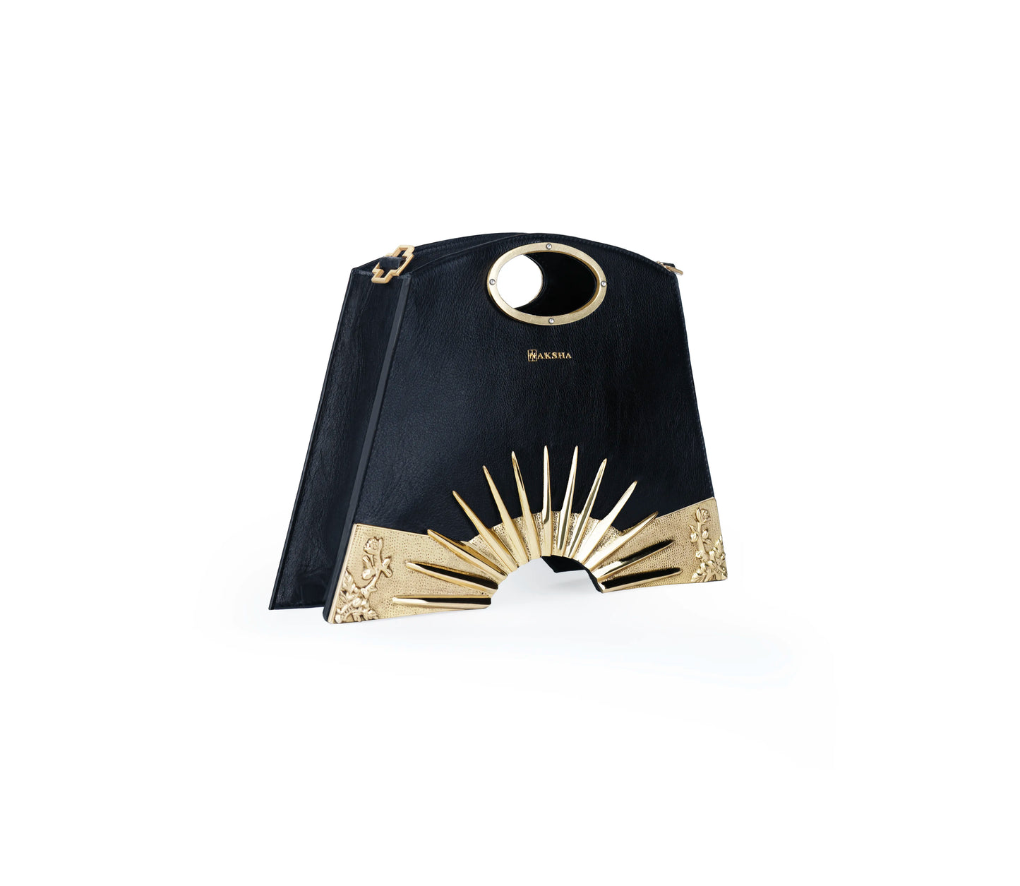 Jewelry-like engraved handle with sunburst detailing on designer handbag