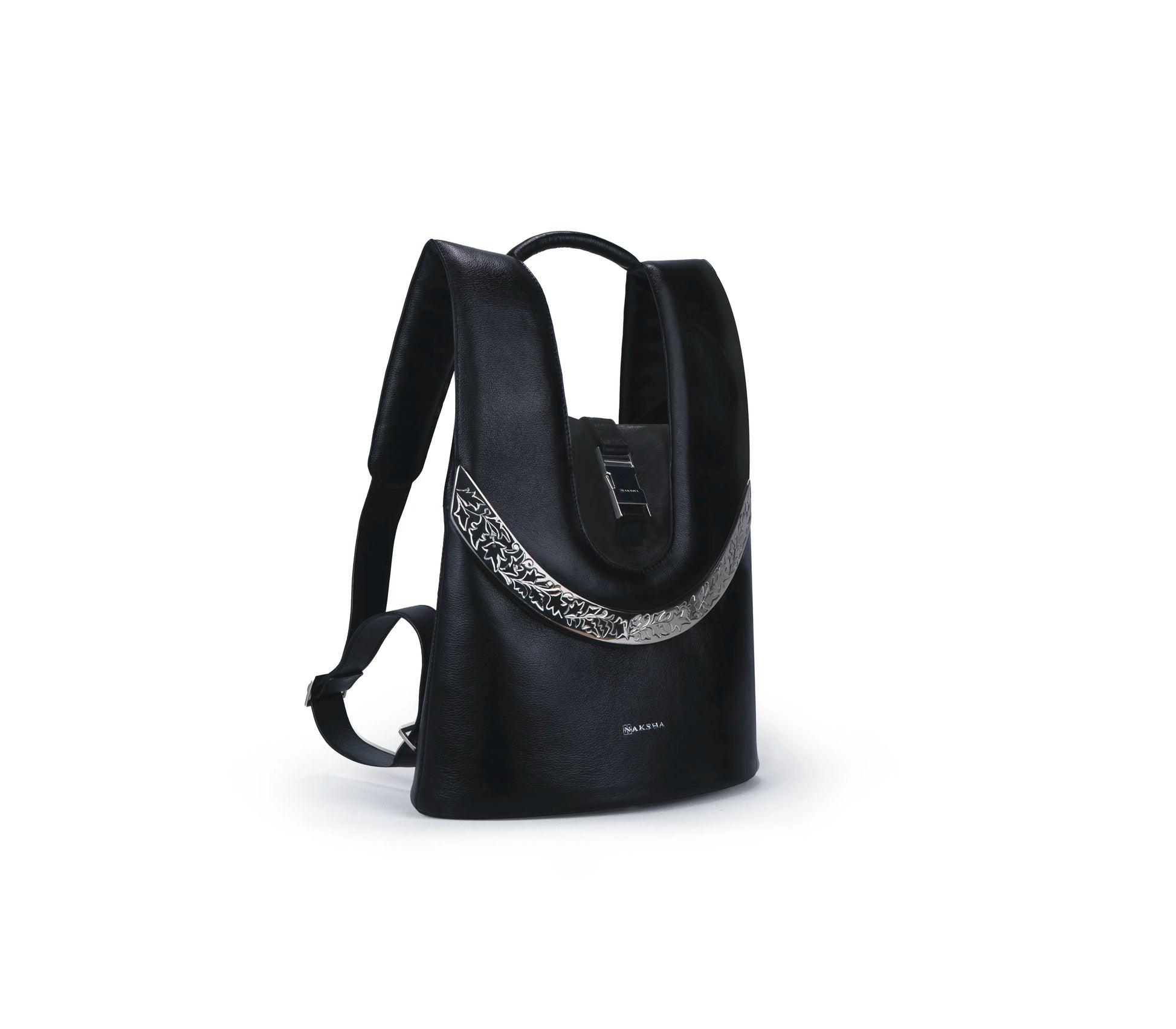 Hand-engraved architectural hardware on designer leather backpack