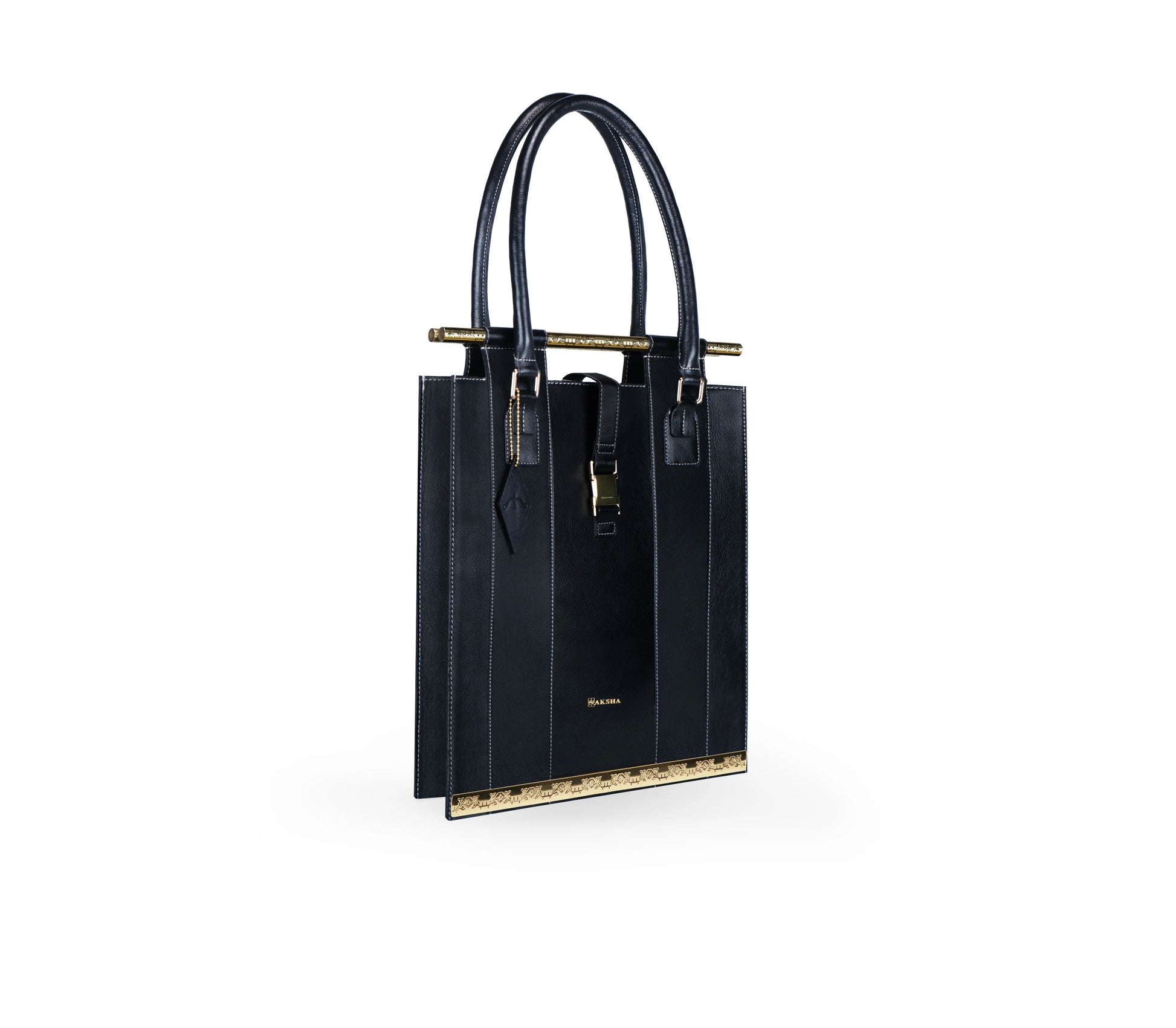 Architectural top-handle tote in full-grain leather — luxury statement bag