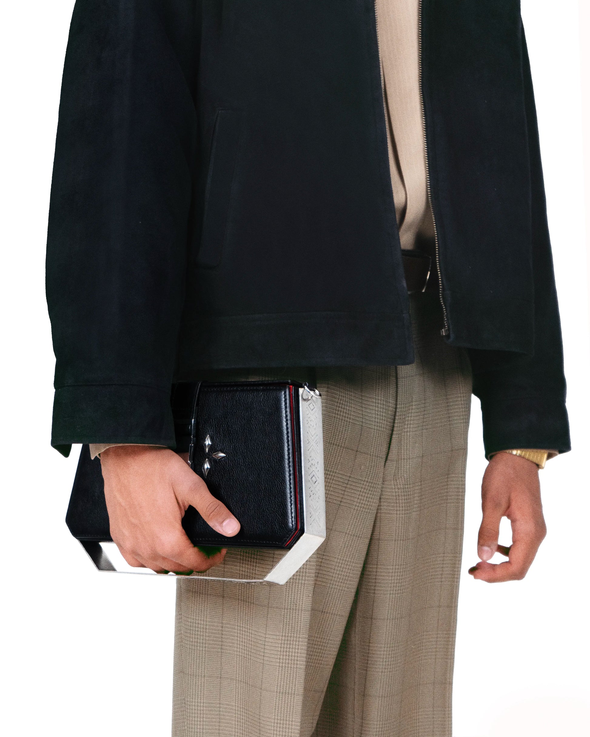 Mini trunk bag styled for luxury evening looks