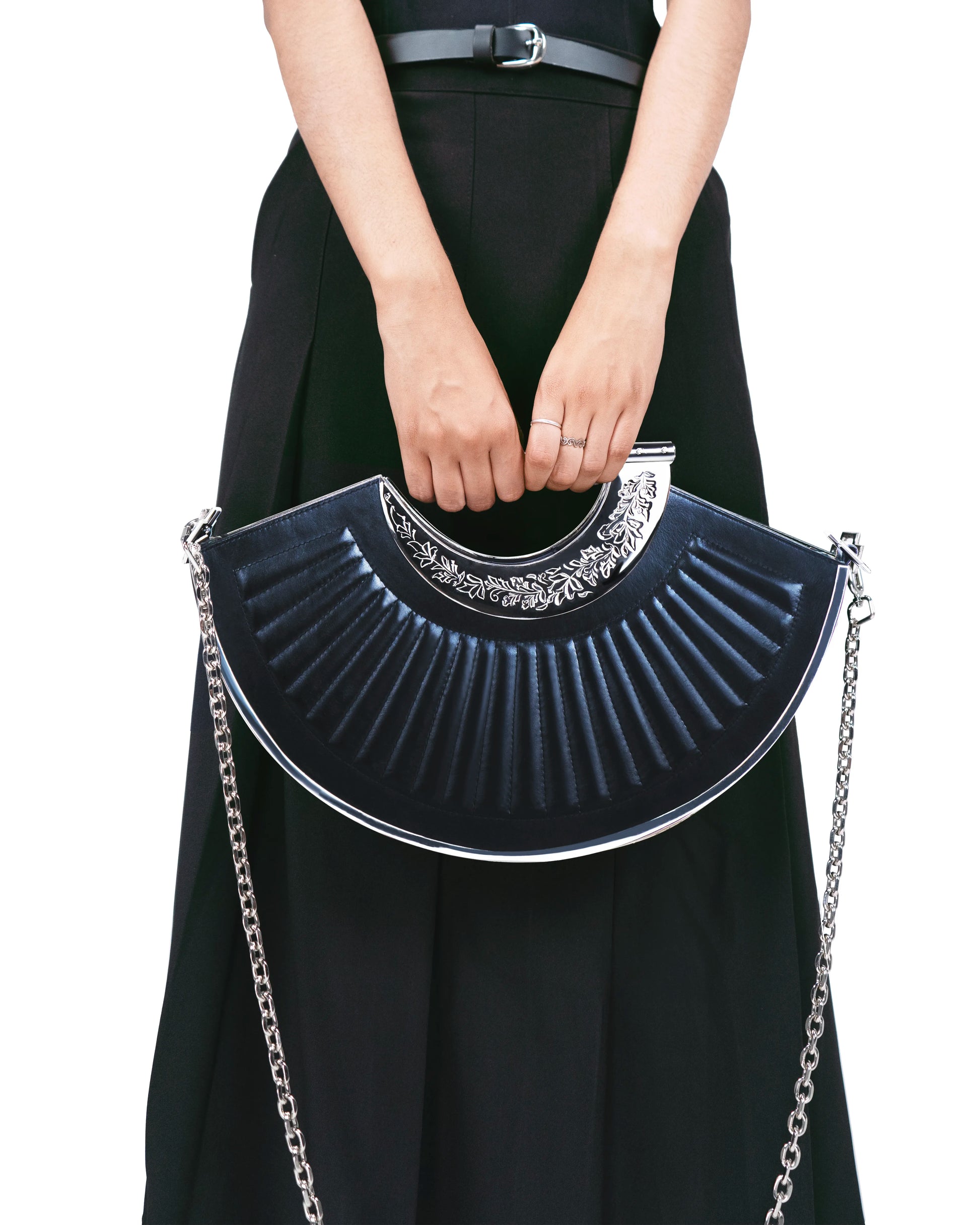 Crossbody styling of Sickle luxury bag with detachable chain